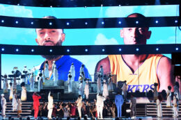 LOS ANGELES, CALIFORNIA - JANUARY 26: Images for the late Nipsey Hussle and Kobe Bryant are projected onto a screen while YG, John Legend, Kirk Franklin, DJ Khaled, Meek Mill, and Roddy Ricch perform onstage during the 62nd Annual GRAMMY Awards at STAPLES Center on January 26, 2020 in Los Angeles, California. (Photo by Kevin Winter/Getty Images for The Recording Academy )