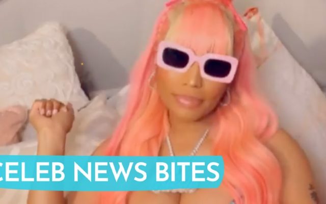 Pregnant Nicki Minaj raps her new song ‘Move Ya Hips’ while showing off her baby bump.