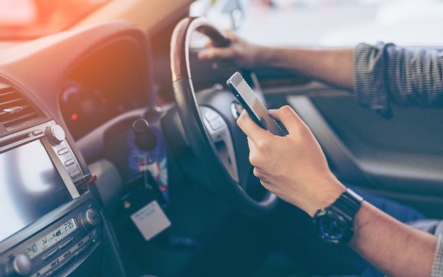 A new law, effective July 1, prohibits motorists from holding or using a cellphone while driving in Indiana.